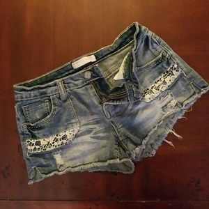Distressed denim shorts